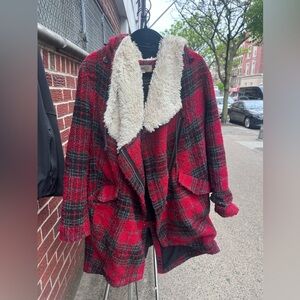 Warm cozy fur hood lined coat. Wonderful for the winter season.